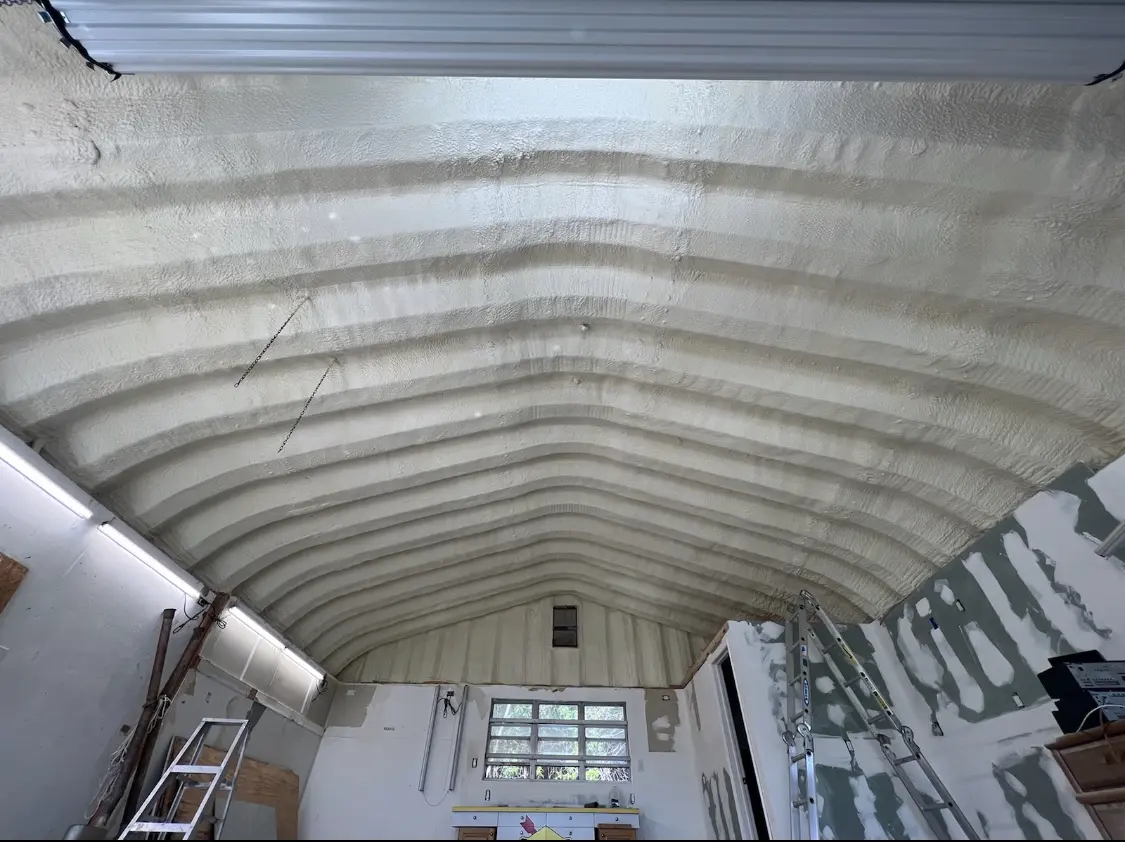 Spray polyurethane foam applied to the underside of a metal roof deck in Southampton
